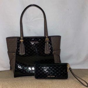 Brown and black Michael Kors Voyager Tote in like new condition
